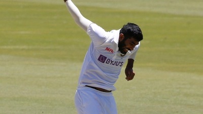 Jasprit Bumrah winces in pain after twisting his ankle.&nbsp; (Reuters)