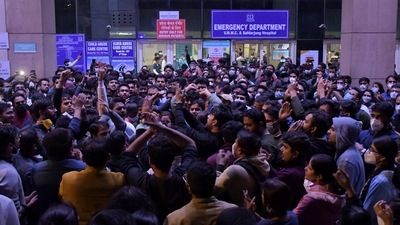 Delhi doctors from various hospitals shout slogans during a protest over the delay in NEET-PG counselling. (ANI Photo) Delhi doctors from various hospitals shout slogans during a protest over the delay in NEET-PG counselling. (ANI Photo)