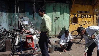 Forensic experts search for clues at the blast site in Malegaon. (AFP file) Forensic experts search for clues at the blast site in Malegaon. (AFP file)