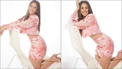 Leaving her silky tresses open down her back in mid-parted hairstyle, Nushrratt accessorised her look with a pair of rose gold hoop earrings from Myrha By Rhea Bothra. &nbsp; (Instagram/nushrrattbharuccha)