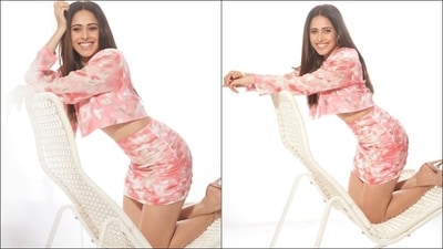 Co-ords have been the biggest style fad this year and Nushrratt's latest viral pictures makes us want us to embrace the hottest fashion trend as they feature the diva donning a floral pink and white full sleeves crop top.&nbsp; (Instagram/nushrrattbharuccha)
