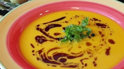 Pumpkin soup: Pumpkins are loaded with nutrients and can be used to rustle up the perfect winter soup. Besides being packed with vitamins and minerals, pumpkin is also relatively low in calories, as it’s 94% water. The high antioxidant level in pumpkin can keep many chronic diseases at bay. "This soup is easy to make and doesn’t necessarily need to be laden with cream, as just the taste of roasted pumpkin tantalises the taste buds enough," writes Kapur. (Pixabay) Pumpkin soup: Pumpkins are loaded with nutrients and can be used to rustle up the perfect winter soup. Besides being packed with vitamins and minerals, pumpkin is also relatively low in calories, as it’s 94% water. The high antioxidant level in pumpkin can keep many chronic diseases at bay. "This soup is easy to make and doesn’t necessarily need to be laden with cream, as just the taste of roasted pumpkin tantalises the taste buds enough," writes Kapur. (Pixabay)