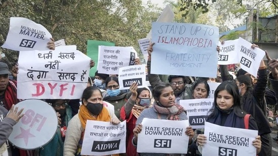Members of All India Students' Association (AISA), Students' Federation of India (SFI) and other organisations protest against the hate speech during a recent religious gathering in Haridwar, on Monday. (PTI)