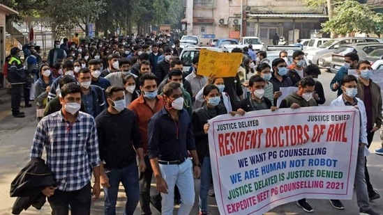 Resident doctors held a protest march in New Delhi against the repeated postponement of the NEET-PG 2021 counselling.