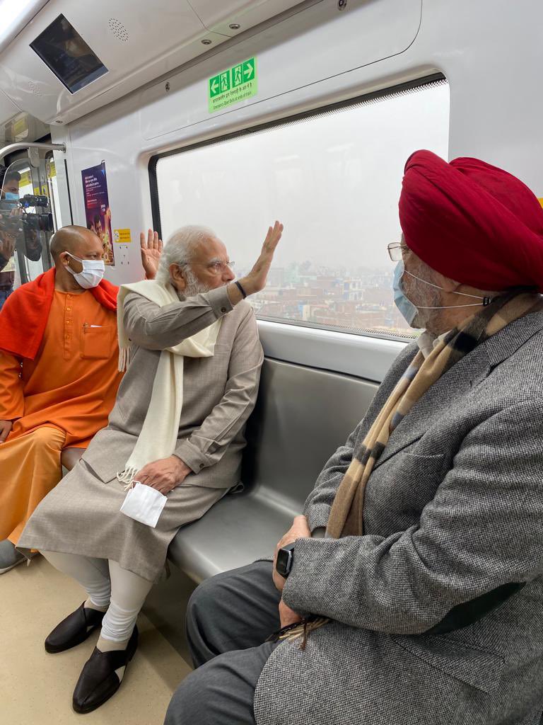 Modi, who was accompanied by CM Yogi Adityanath and Union minister Hardeep Singh Puri, took a little over 10 minutes ride on the metro from the IIT metro station to Geeta Nagar. (Twitter/@narendramodi) Modi, who was accompanied by CM Yogi Adityanath and Union minister Hardeep Singh Puri, took a little over 10 minutes ride on the metro from the IIT metro station to Geeta Nagar. (Twitter/@narendramodi)