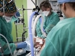 Nurses tend to a Covid-19 patient at a hospital outside Paris.