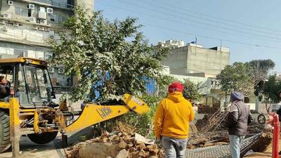 MC officials taking down an illegal under-construction commercial building in the residential area of Sarabha Nagar block- B in on December 29, 2021. (HT Photo)