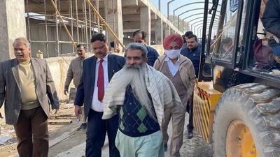 Cabinet minister Bharat Bhushan Ashu inspecting the ongoing works of Pakhowal road RUB project. which is ready for its trail run, along with Mayor Balkar Sandhu and MC Commissioner Pardeep Sabharwal in Ludhiana on December 29, 2021. (HT PHOTO) Cabinet minister Bharat Bhushan Ashu inspecting the ongoing works of Pakhowal road RUB project. which is ready for its trail run, along with Mayor Balkar Sandhu and MC Commissioner Pardeep Sabharwal in Ludhiana on December 29, 2021. (HT PHOTO)