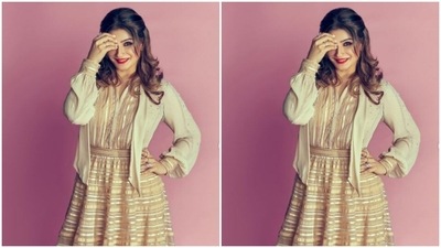 The gown came with flowy details below the waist. Raveena completed her look with a short ivory white blazer with dramatic full sleeves. (Instagram/@officialraveenatandon)
