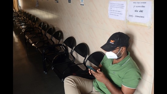 A person is seen waiting for his vaccine at Kamala Nehru hospital. (Shankar Narayan/HT PHOTO)