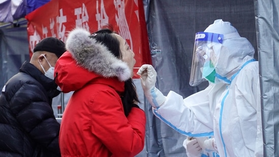 Xi’an reported 151 infections on Wednesday, down from 175 on Tuesday, as residents have been asked to stay indoors and driving is banned.(AFP)