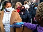 People line up to receive test kits to detect Covid-19 in New York.(AP Photo) People line up to receive test kits to detect Covid-19 in New York.(AP Photo)