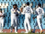 India's bowler Jasprit Bumrah, left, celebrates with teammates after bowling South Africa's batsman Rassie van der Dussen, during the fourth day of the Test Cricket match between South Africa and India at Centurion Park in Pretoria, South Africa, Wednesday, Dec. 29, 2021(AP)
