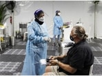 Australia's proposed new testing rules would rely more on rapid antigen tests(Loren Elliott/REUTERS ) Australia's proposed new testing rules would rely more on rapid antigen tests(Loren Elliott/REUTERS )