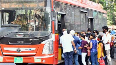 A conductor checks Covid-19 vaccine certificate before giving a bus ticket to passengers, in Mumbai. (ANI) A conductor checks Covid-19 vaccine certificate before giving a bus ticket to passengers, in Mumbai. (ANI)