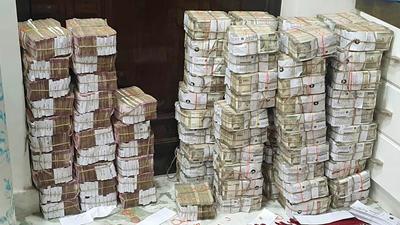 Cash and sandalwood recovered from businessIman Piyush Jain's residence during a raid conduct by the team of GST Intelligence, in Kannauj on Monday. (Arshad Khan) Cash and sandalwood recovered from businessIman Piyush Jain's residence during a raid conduct by the team of GST Intelligence, in Kannauj on Monday. (Arshad Khan)