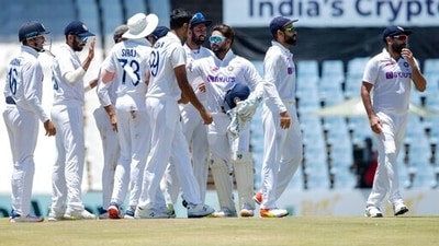 India's captain Virat Kohli, second from right, celebrates with teammates at end of the fifth day of the Test Cricket match between South Africa and India at Centurion Park in Pretoria, South Africa, Thursday, Dec. 30, 2021. India beat South Africa by 113 runs. (AP)