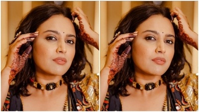 Swara's lehenga blouse came with traditional long sleeves and detailed embroidery in moti, mirrors and zari. She paired it with a flowy skirt and a black dupatta with the similar details. (Instagram/@reallyswara)