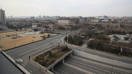 Nearly empty roads in Xi'an in China's northern Shaanxi province, amid a coronavirus lockdown in the city.&nbsp;(AFP)