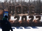 A man looks at the decorations for the coming 2022 Year on New Year's Eve in Seoul, South Korea, Friday, Dec. 31, 2021. &nbsp;
