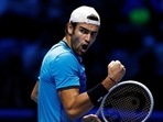 Italy's Matteo Berrettini celebrates during his group stage match against Germany's Alexander Zverev