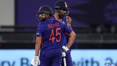 India's KL Rahul and Rohit Sharma rest in between overs during the Cricket Twenty20 World Cup match between India and Namibia in Dubai, UAE. (AP) India's KL Rahul and Rohit Sharma rest in between overs during the Cricket Twenty20 World Cup match between India and Namibia in Dubai, UAE. (AP)