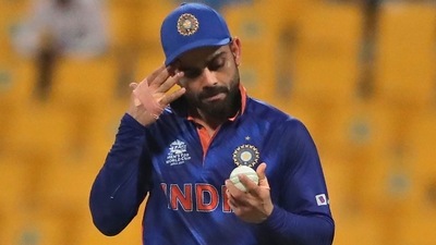 India's captain Virat Kohli holds the ball before handing it over to the next bowler during the Cricket Twenty20 World Cup match between India and Afghanistan in Abu Dhabi, UAE. (AP) India's captain Virat Kohli holds the ball before handing it over to the next bowler during the Cricket Twenty20 World Cup match between India and Afghanistan in Abu Dhabi, UAE. (AP)