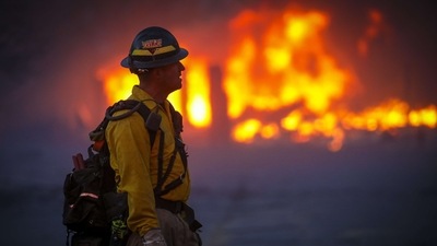 Wind gusts of over 100 miles (160 kilometres) an hour have been reported in some places, fanning the flames and complicating firefighting efforts. (AFP) Wind gusts of over 100 miles (160 kilometres) an hour have been reported in some places, fanning the flames and complicating firefighting efforts. (AFP)