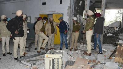 Police inspect the site of an explosion at the district court complex in Ludhiana, Punjab. (PTI) Police inspect the site of an explosion at the district court complex in Ludhiana, Punjab. (PTI)