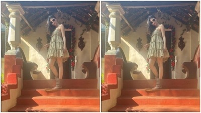 Mouni posed under the winter sun in a flowy short dress. (Instagram/@imouniroy)