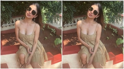 In tinted shades and open tresses, Mouni posed for the camera. (Instagram/@imouniroy)