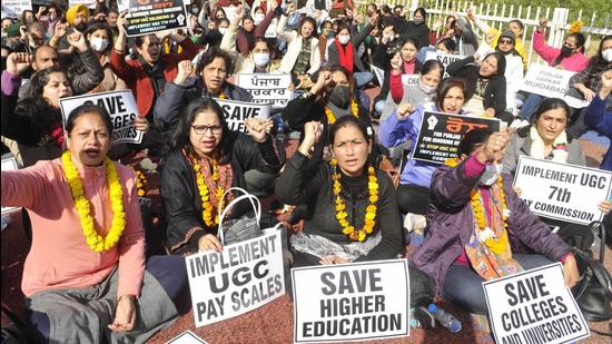 Teachers from across the state and the Chandigarh have joined in the protest called by the PFUCTO demanding implementation of revised UGC pay scales as per the as per Punjab government’s seventh pay commission . (HT File)