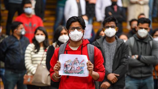 Resident doctors are seen at a protest over the delay in NEET-PG counselling at Lady Hardinge Hospital in New Delhi on Thursday. (Hindustan Times)