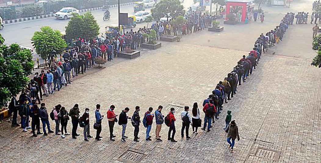 Long queues, like this one outside Akshardham Metro Station, are being seen across the city. (Photo: PTI) Long queues, like this one outside Akshardham Metro Station, are being seen across the city. (Photo: PTI)