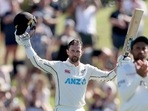 Devon Conway of New Zealand celebrates his century during play on day one of the first cricket test between Bangladesh and New Zealand at Bay Oval in Mount Maunganui, New Zealand, Saturday, Jan. 1, 2022.&nbsp;