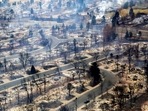 Colorado’s wildfire season typically ends in autumn, but the region is so dry and devoid of snow that it remains primed for blazes. In picture - Boulder County neighborhood destroyed by the wildfire as seen from a Colorado National Guard helicopter during a flyover by Gov. Jared Polis.
