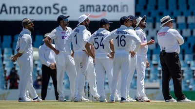 Umpire Marais Erasmus of South Africa, far right, with India's players watch a review on an electronic screen after requested by South Africa's captain Dean Elgar after dismissed for LBW, during the fifth day of the Test Cricket match between South Africa and India at Centurion Park in Pretoria, South Africa, Thursday, Dec. 30, 2021 (AP) Umpire Marais Erasmus of South Africa, far right, with India's players watch a review on an electronic screen after requested by South Africa's captain Dean Elgar after dismissed for LBW, during the fifth day of the Test Cricket match between South Africa and India at Centurion Park in Pretoria, South Africa, Thursday, Dec. 30, 2021 (AP)