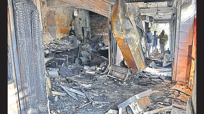 Two businessmen, whose shops were also consumed by the rapidly spreading flames in Ferozepur Market, Ludhiana , have sought an FIR against the owner of the Vada Pav eatery, where the flames allegedly broke out, and the PSPCL. (Harsimar Pal Singh/HT)