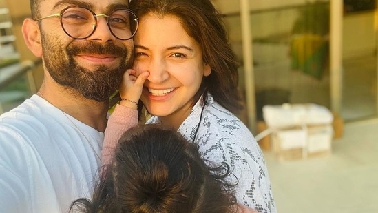 Virat, Anushka, and little Vamika. Virat, Anushka, and little Vamika.