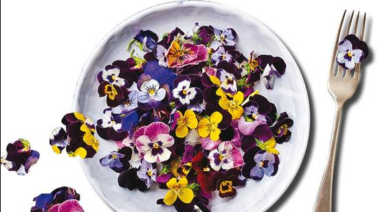 Using flowers as garnish is the new trend in restaurants Using flowers as garnish is the new trend in restaurants