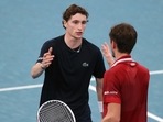 France's Ugo Humbert with Russia's Daniil Medvedev after winning their group stage match&nbsp;
