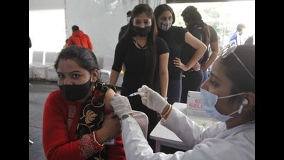 Residents lining up to get jabbed at the vaccination centre in Sukhna Lake , Chandigarh. As many as 9,126 people were vaccinated in the city on Sunday. (Keshav Singh/HT) Residents lining up to get jabbed at the vaccination centre in Sukhna Lake , Chandigarh. As many as 9,126 people were vaccinated in the city on Sunday. (Keshav Singh/HT)