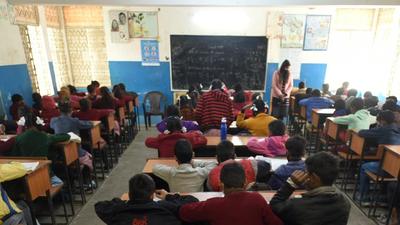 Omicron: Officials said many schools that opened the schools for classes 6-10 are finding it difficult to maintain social distancing norms in classrooms due to lack of space, forcing teachers to make them sit close to each other. (Representative image) (HT File Photo/Sunil Ghosh)