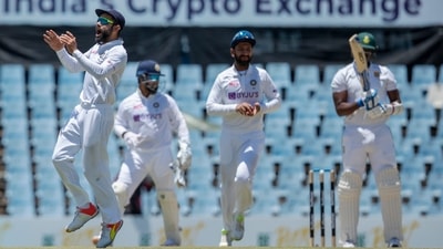 India's captain Virat Kohli, left, celebrates with teammates after the dismissal of South Africa's batsman Lungi Ngidi, far right, during the fifth day of the Test Cricket match between South Africa and India at Centurion Park in Pretoria, South Africa, Thursday, Dec. 30, 2021 (AP)