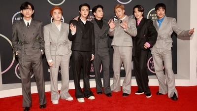 BTS members V, Suga, Jin, Jungkook, RM, Jimin and J-Hope pose for the camera. (REUTERS)