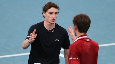 France's Ugo Humbert with Russia's Daniil Medvedev after winning their group stage match&nbsp; (REUTERS)