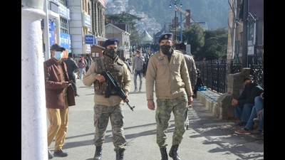 Armed security personnel on the Mall Road in Shimla on Saturday. As per the information provided by police officials, a Pakistan-based terror outfit had threatened to blow up the water storage tank below The Ridge. (Deepak Sansta/HT) Armed security personnel on the Mall Road in Shimla on Saturday. As per the information provided by police officials, a Pakistan-based terror outfit had threatened to blow up the water storage tank below The Ridge. (Deepak Sansta/HT)