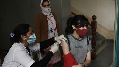 A woman gets a dose of the Covid-19 vaccine at an urban primary health center in Gurugram’s Sector 31 on Tuesday. (Vipin Kumar / HT PHOTO) A woman gets a dose of the Covid-19 vaccine at an urban primary health center in Gurugram’s Sector 31 on Tuesday. (Vipin Kumar / HT PHOTO)