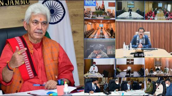 Jammu and Kashmir L-G Manoj Sinha chairs a high-level meeting with Covid Task Force, DCs, and SPs to review Covid-19 status, in Srinagar on Sunday. (ANI)