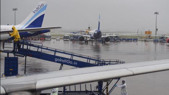 Chennai: Aeroplanes stand parked amid low visibility as operation of several flights were delayed due to heavy rain in Chennai, on Friday (PTI)